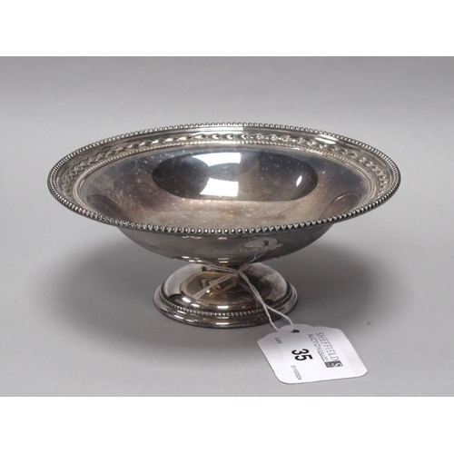 35 - A Hallmarked Silver Pedestal Dish, JD&S, Sheffield 1935(?), of circular form with textured edge, on ... 