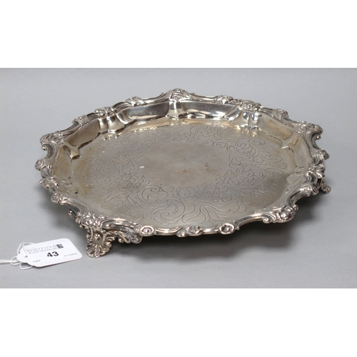 43 - A Georgian Hallmarked Silver Waiter, (marks rubbed) of shaped circular form with foliate decoration,... 