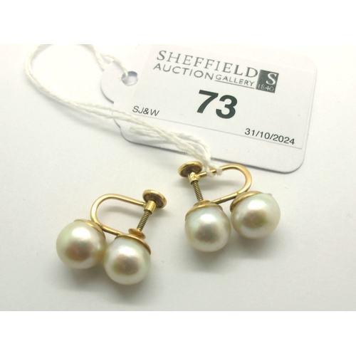 73 - A Pair of Twin Pearl Earrings, of vertical design, to unpierced screw fitting, stamped 