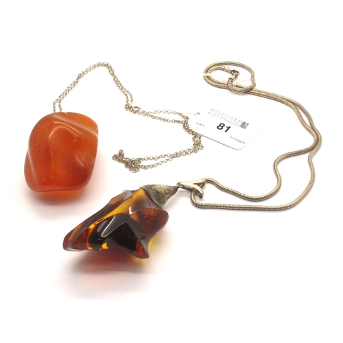 81 - A Large Modernist Style Amber Colour Pendant, of abstract design with applied mount, suspended on sm... 