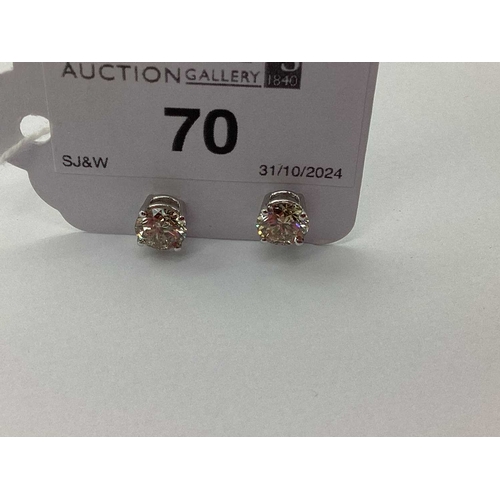 70 - A Pair of Modern 18ct White Gold Single Stone Diamond Earstuds, each brilliant cut stone four claw s... 