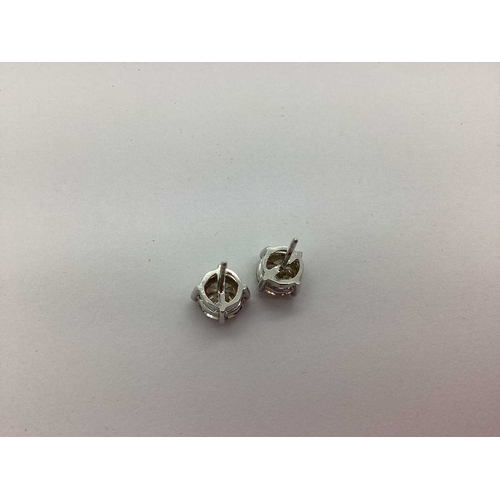 72 - A Pair of Modern 18ct White Gold Single Stone Diamond Earstuds, each brilliant cut stone four claw s... 