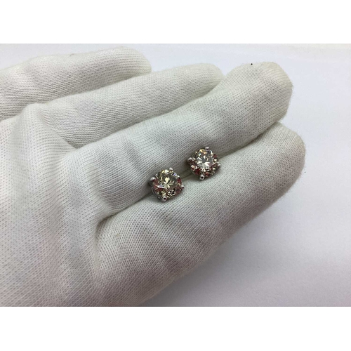 72 - A Pair of Modern 18ct White Gold Single Stone Diamond Earstuds, each brilliant cut stone four claw s... 