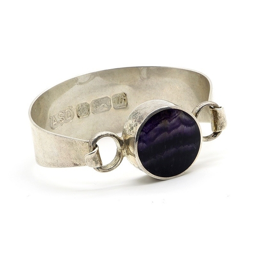 137 - Anthony Stephen Darwent; A Hallmarked Silver Blue John Inlaid Bangle, Sheffield 1996, the blue john ... 