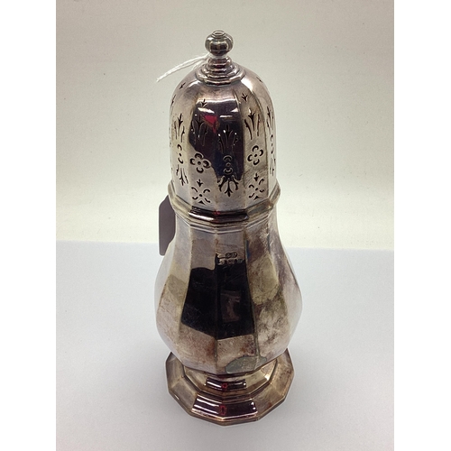 30 - A Hallmarked Silver Sugar Shaker, SLd, Birmingham 1932, of stylised gadrooned form with pierced deta... 