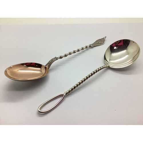 35 - A German Spoon, with plain bowl and twisted handle (stamped crescent and crown mark and 