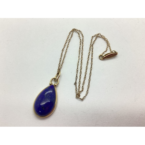 44 - A Hardstone Inlaid Pendant, teardrop form with beaded surmount stamped 