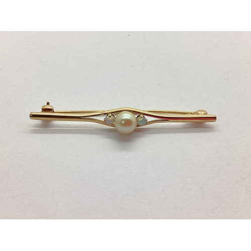 62 - A 9ct Gold Opal and Freshwater Pearl Bead Bar Brooch, collet set within pierced openwork design, 5.2... 