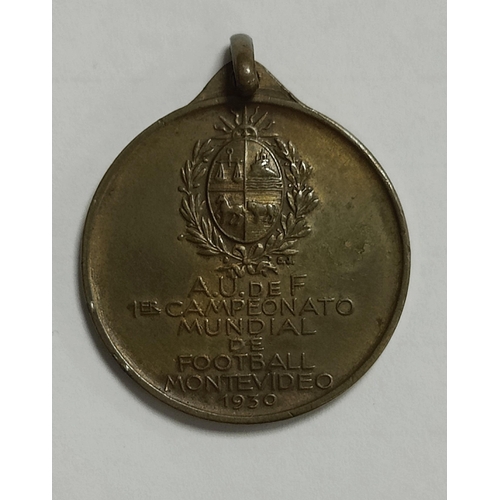 597 - 1930 World Cup Commemorative Medal in Bronze, the front featuring Tower of Homage at The Centenary S... 