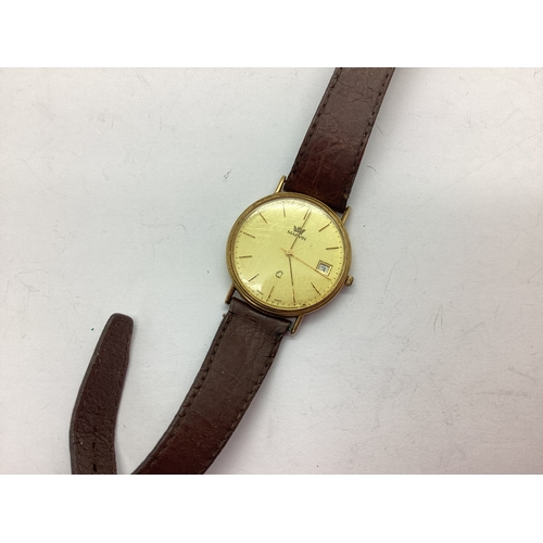 244 - Marvin; A 9ct Gold Cased Vintage Gent's Wristwatch, the signed dial with baton markers and date aper... 