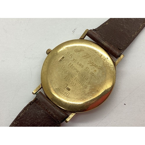 244 - Marvin; A 9ct Gold Cased Vintage Gent's Wristwatch, the signed dial with baton markers and date aper... 