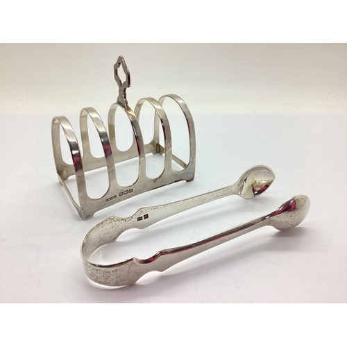 4 - A Hallmarked Silver Five Bar Toast Rack, C&SLtd, Sheffield 1963, of minimalist arched design with sh... 