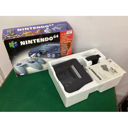 727 - A Nintendo 64 (N64) Gaming Console, box contents comprising of Nintendo 64 control deck, aerial exte... 