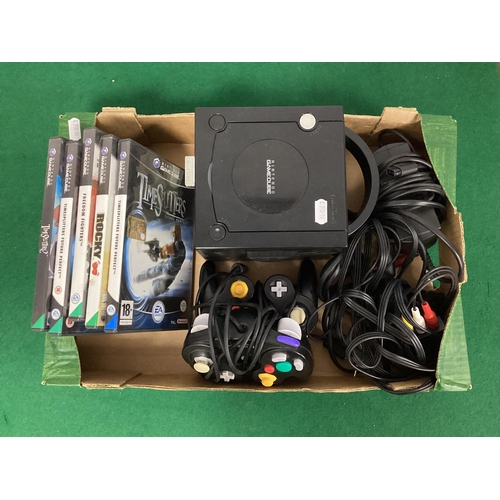 729 - A Nintendo Game Cube Console, two hand controllers, three games to including Timesplitters 2, Freedo... 