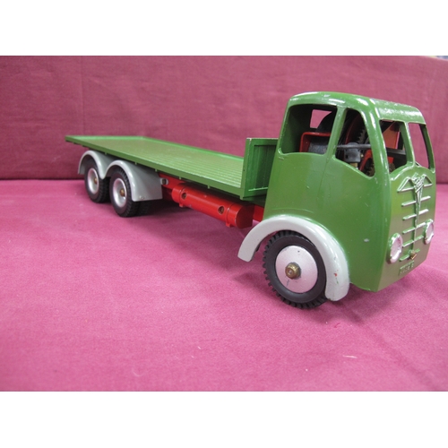 830 - A Shackleton Foden Flat Bed Lorry, green/light grey, clockwork working, overall very good/excellent,... 