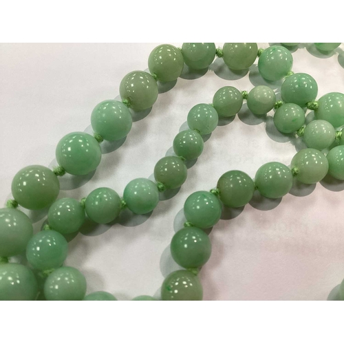 144 - JKa Kohle of Pforzheim; A Jade Bead Multi-row Necklace, the graduated beads knotted to fancy clasp s... 