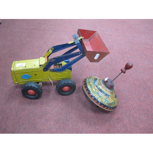 1376 - GAMA, Mechanik Tin Plate Tractor, (wheel hub missing), together with a Chad Valley humming top (2).