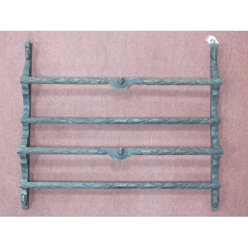 1467 - Oak Wall Rack, carved with masks, 79cm wide.