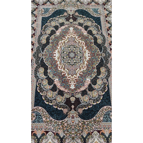 1530 - Expada Tassled Polyester Rug, allover heavilly decorated in many colours with central cartouche, bla... 