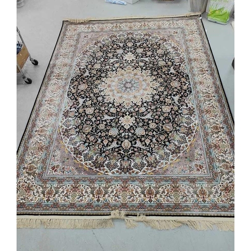 1538 - Khatereh Tassled Cotton Rug, allover heavily decorated in many colours with central symmetrical moti... 