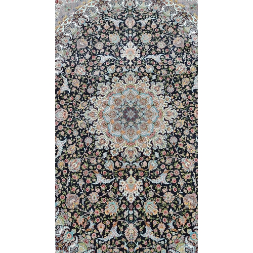 1538 - Khatereh Tassled Cotton Rug, allover heavily decorated in many colours with central symmetrical moti... 