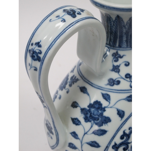 1203 - Crown Devon 'Widdecombe Fair' Musical Jug, Oriental ewer in blue and white pottery, 22.5cm high. (2)... 