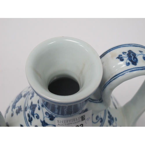 1203 - Crown Devon 'Widdecombe Fair' Musical Jug, Oriental ewer in blue and white pottery, 22.5cm high. (2)... 