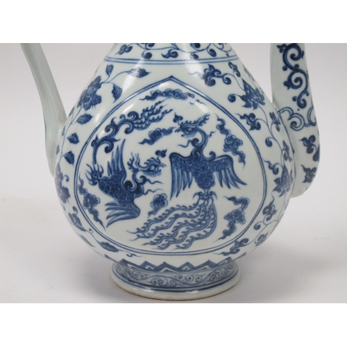 1203 - Crown Devon 'Widdecombe Fair' Musical Jug, Oriental ewer in blue and white pottery, 22.5cm high. (2)... 