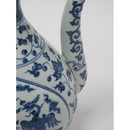 1203 - Crown Devon 'Widdecombe Fair' Musical Jug, Oriental ewer in blue and white pottery, 22.5cm high. (2)... 