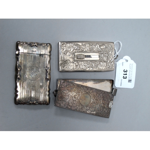 313 - A Victorian Hallmarked Silver Sliding Card Case, (hallmarks rubbed), allover scrollwork decoration w... 