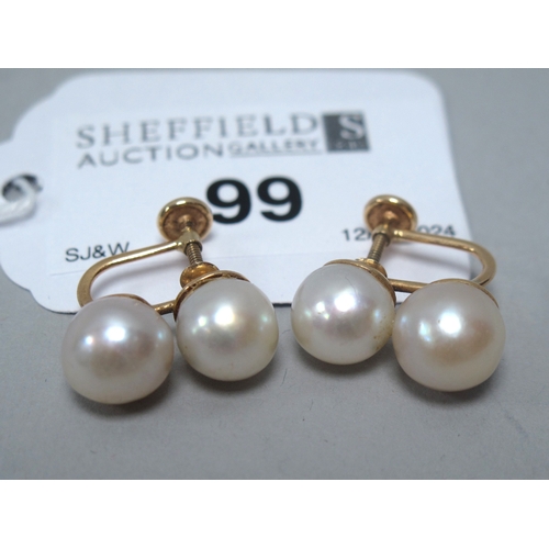 99 - A Pair of Twin Pearl Earrings, of vertical design, to unpierced screw fitting, stamped 