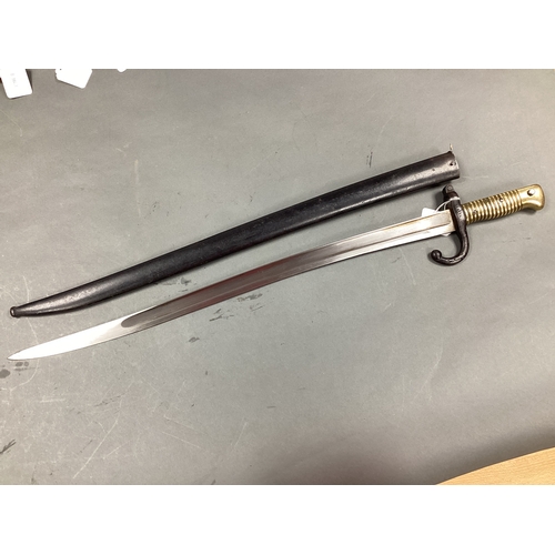 468 - XIX Century French Model 1874 Chassepot Bayonet and Scabbard, bayonet manufacturer mark 'Mre N/e de ... 