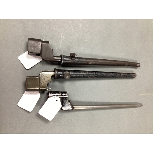 509 - WWII Two Britsh No.4 MK II Spike Bayonets with Scabbards, also one similar without scabbards.