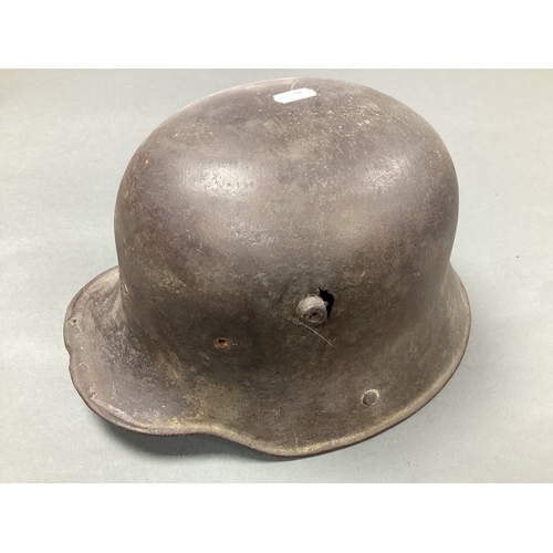 562 - WWI German Army M16/M17 Combat Helmet, shell only semi relic condition.