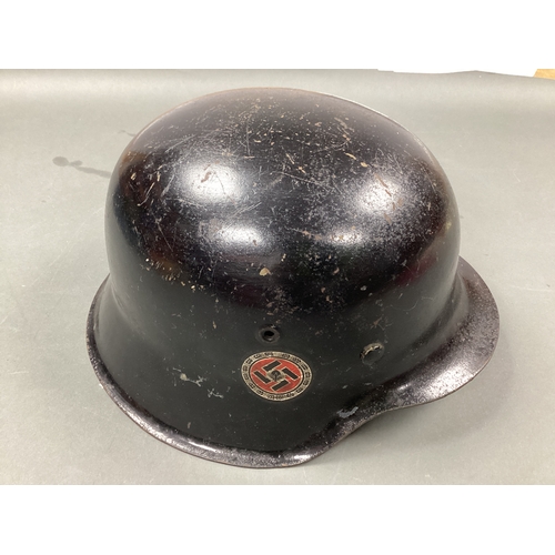 563 - WWII German Third Reich M42 Helmet, black paint finish to exterior and green paint finish to interio... 