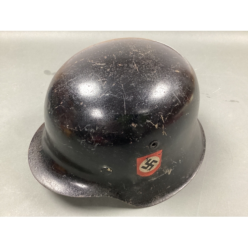 563 - WWII German Third Reich M42 Helmet, black paint finish to exterior and green paint finish to interio... 