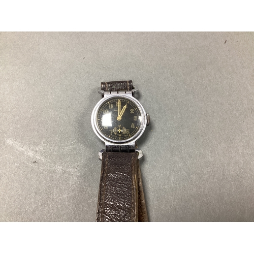 621 - WWI Style Trench Wrist Watch on leather strap, appears not to function.