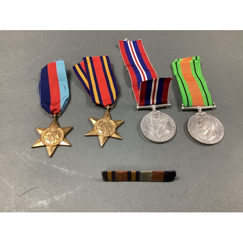 639 - WWII Medal Group 1939-1945 Star, Burma Star, Defence Medal and 1939-1945 War Medal, plus medal ribbo... 