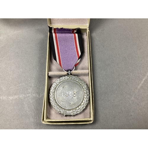 643 - WWII German Third Reich Luftschutz Medal 2nd Class, with presentation box.