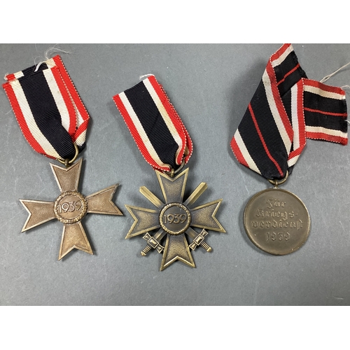 677 - WWII German Third Reich War Merit Cross with Swords, War Merit Cross and War Merit Medal.