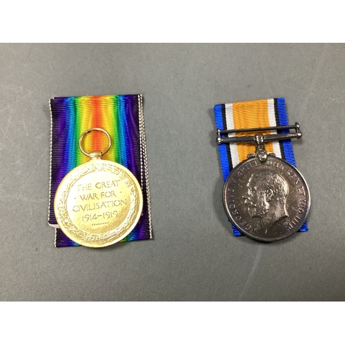 678 - WWI Medal Duo, comprising British War Medal and Victory Medal, with box, awarded to M-304110 Pte J T... 