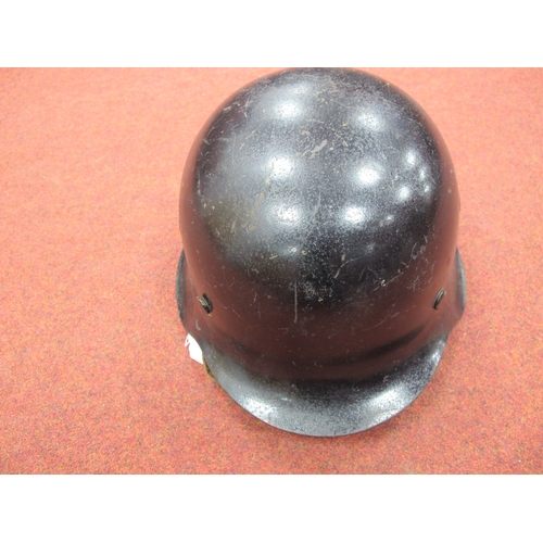 563 - WWII German Third Reich M42 Helmet, black paint finish to exterior and green paint finish to interio... 