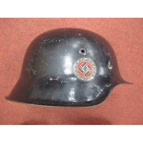 563 - WWII German Third Reich M42 Helmet, black paint finish to exterior and green paint finish to interio... 