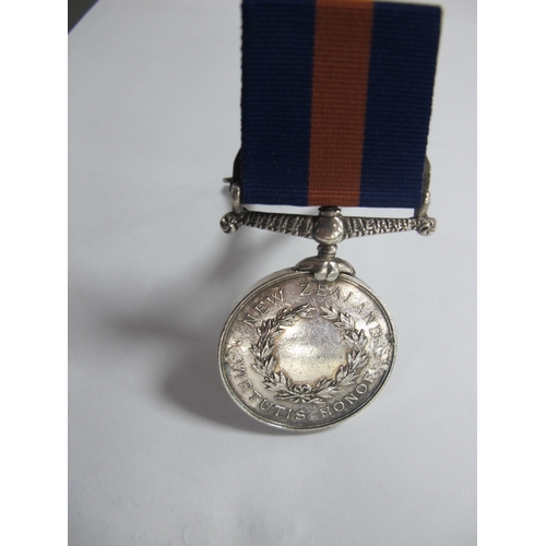 705 - Scarce New Zealand Medal, adapted into menu card holder, for use in offices mess. Medal awarded to 7... 