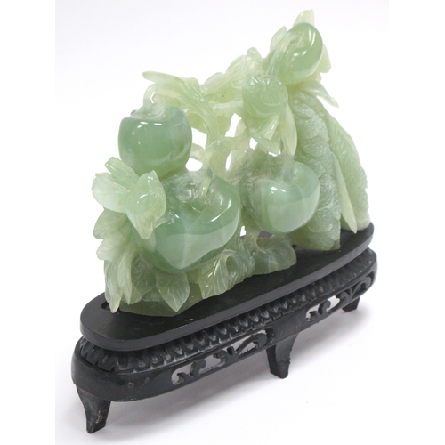 1154 - A Mid/Late XX Century Jadeite Carving of a Fruiting Tree, hardwood stand, 16cm high.