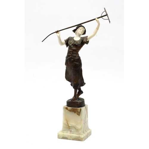 1277 - EUGENE BARILLOT (1841-1900) 
A Bronze and Ivory Model of a Maiden, portrayed standing and holding a ... 