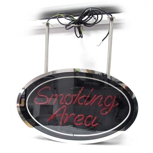 1342 - A Modern Neon Sign 'Smoking Area', with red lettering in a chrome oval display, no transformer, with... 