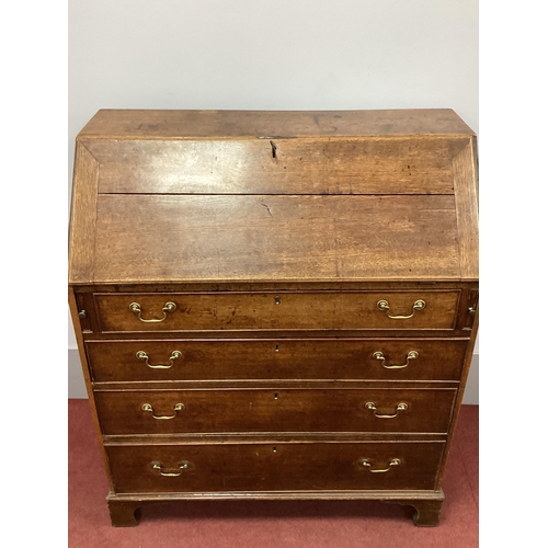 1483 - An XVIII Century Oak Bureau, with fall front to fitted interior, four long drawers, on bracket feet,... 