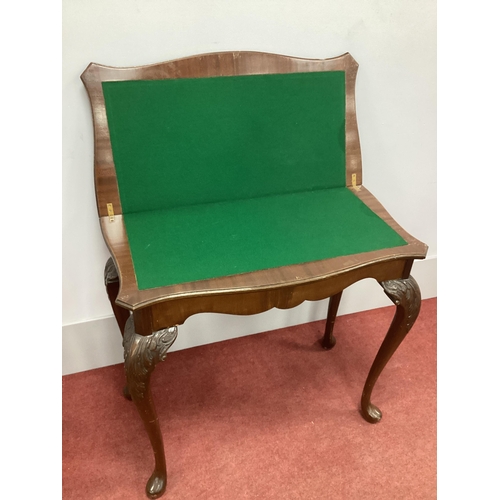 1493 - A XX Century Serpentine Shaped Card Table, with fold-over top, on carved cabriole legs and pad feet,... 