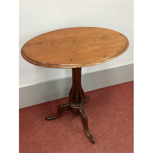 1498 - A XIX Century Mahogany Pedestal Table, with oval top, moulded edge and shaped pedestal on cabriole l... 